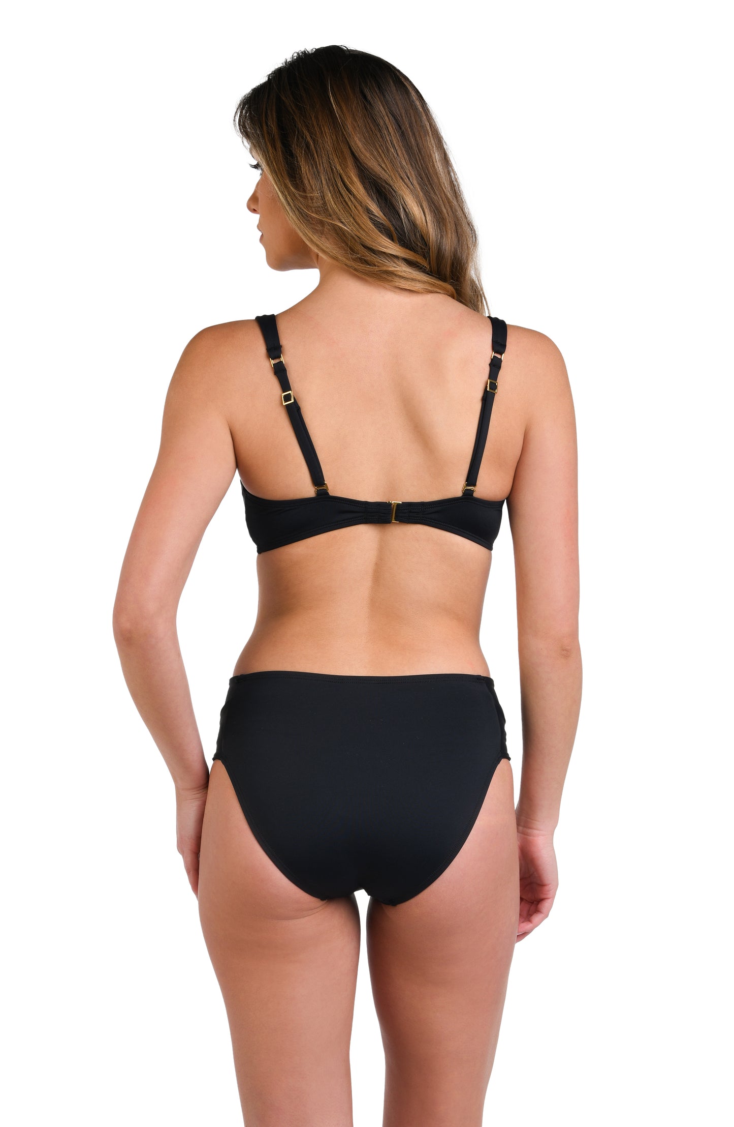 Model is wearing a solid black colored over-the-shoulder bikini swimsuit top.