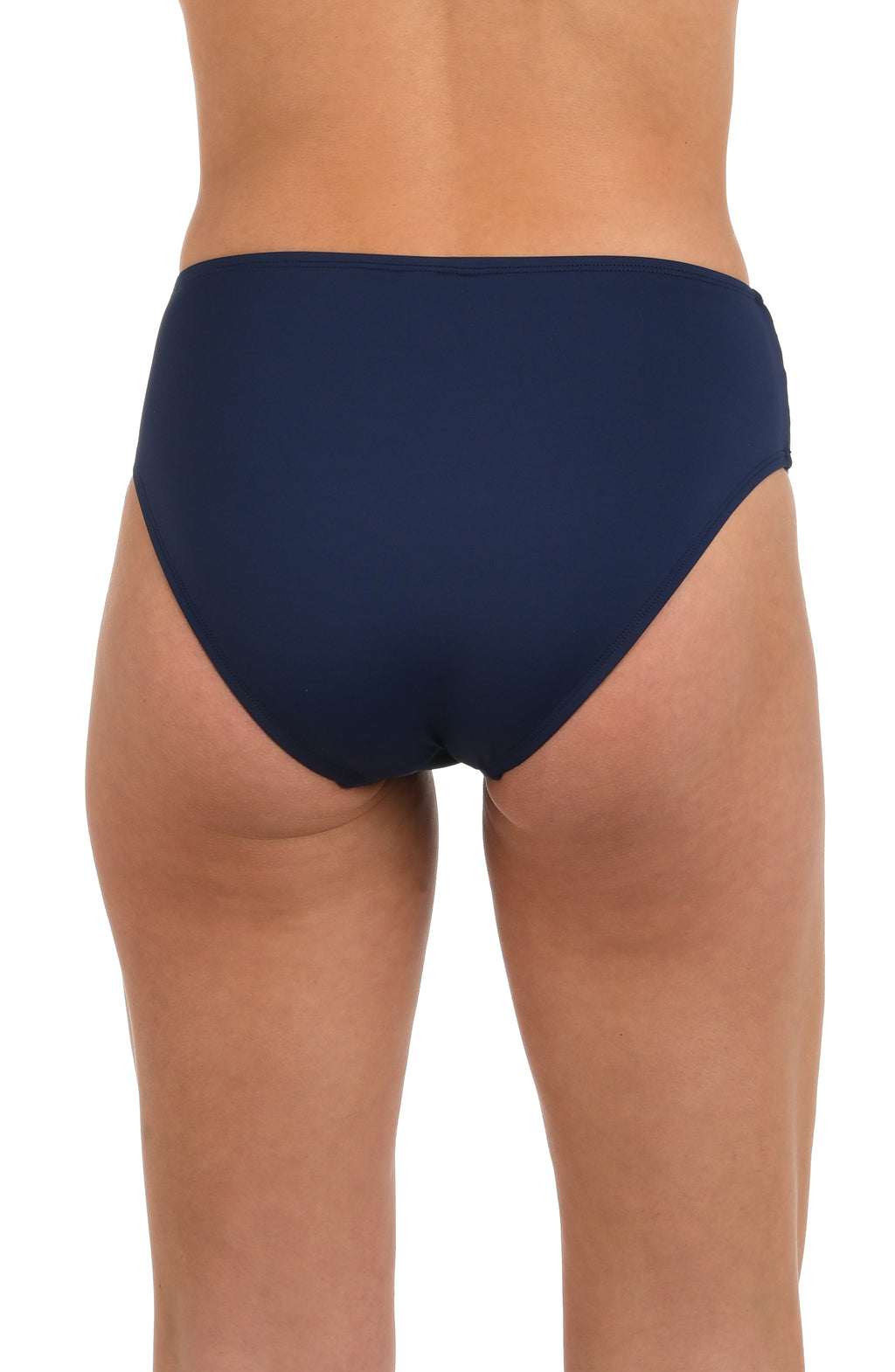 Image of model wearing a red, white, and blue color block mid-waist bikini bottom featuring a crossover front and moderate rear coverage.