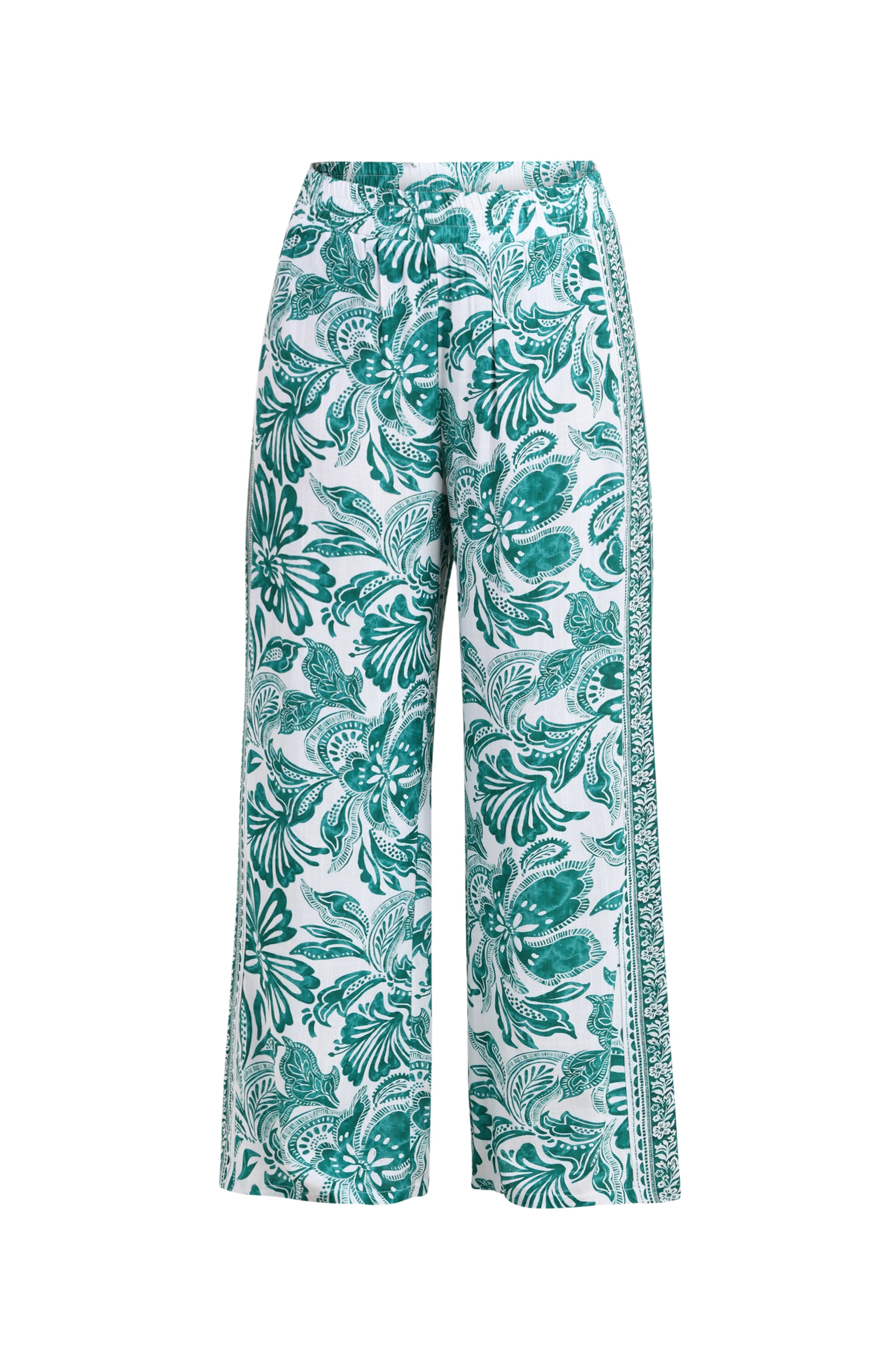 Green and white floral-patterned pants on a white background
