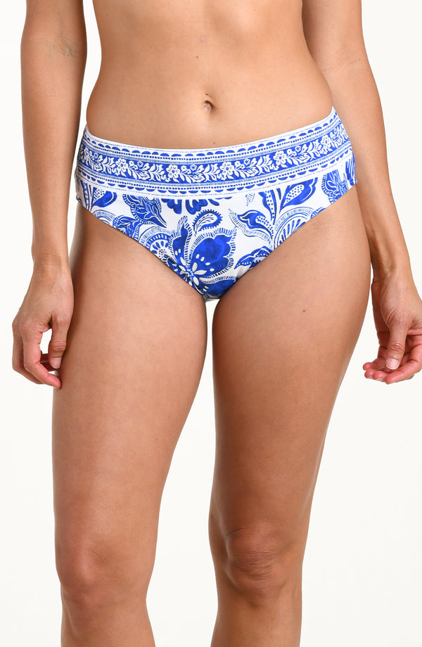 Blue and white patterned bikini bottom on a plain background