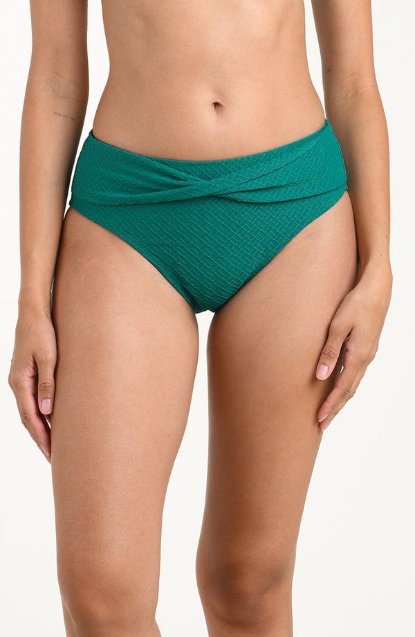 Teal bikini bottom on a plain background