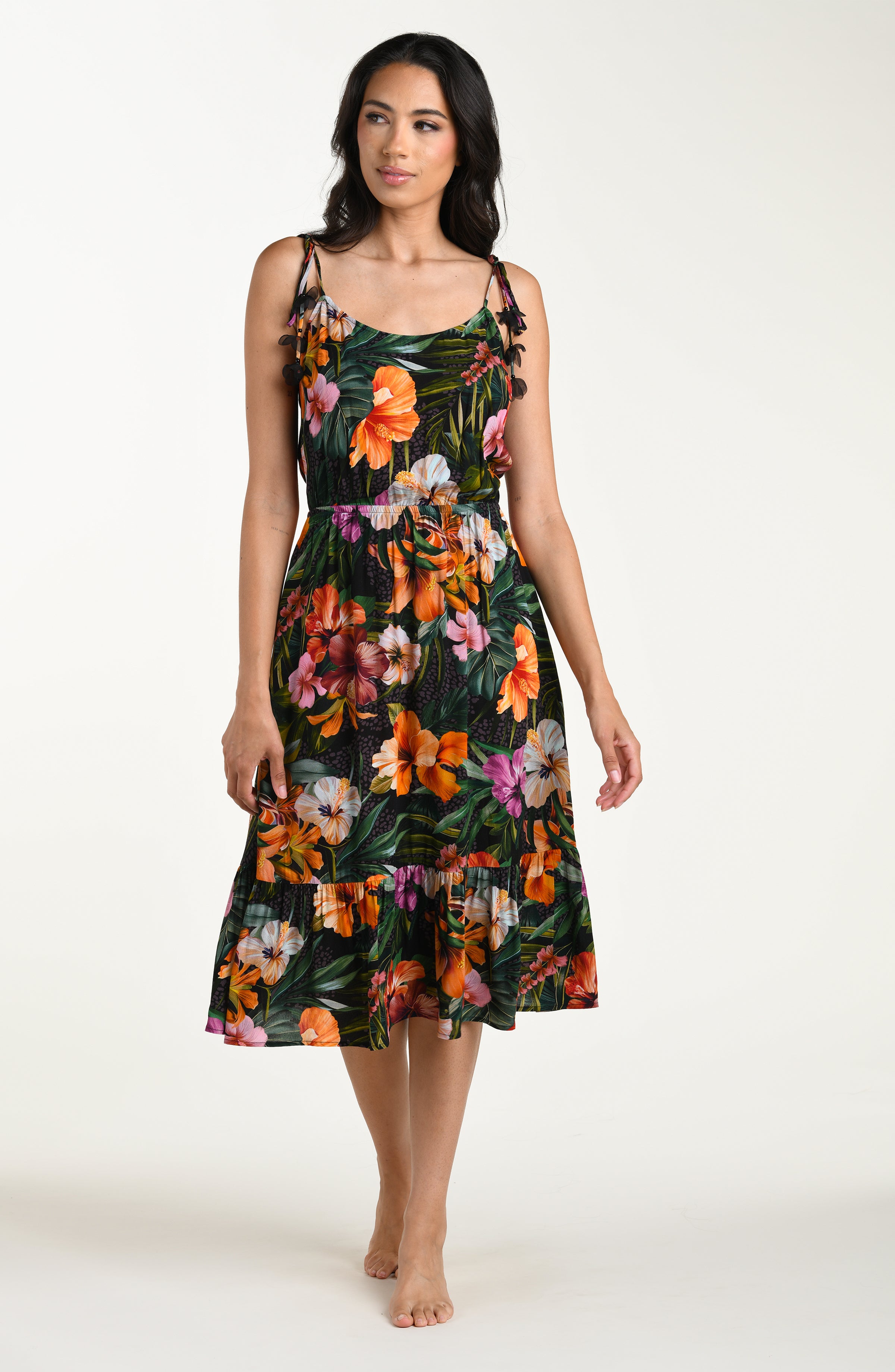 Full body front image of a model wearing a multicolored tropical printed cover-up dress featuring a relaxed, flowy fit with lightweight fabric and adjustable straps for all-day comfort.