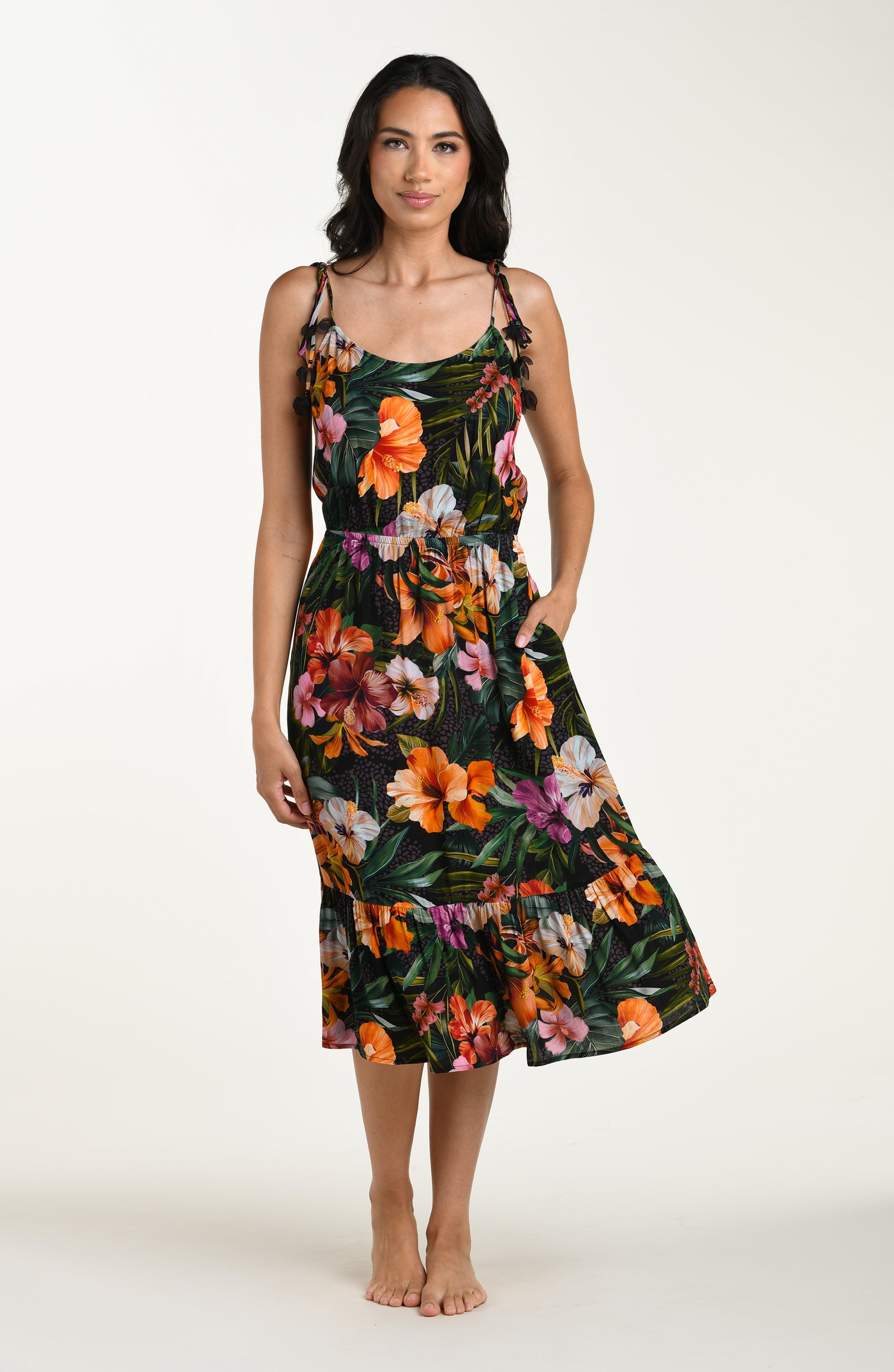 
                  
                    Full body front image of a model wearing a multicolored tropical printed cover-up dress featuring a relaxed, flowy fit with lightweight fabric and adjustable straps for all-day comfort.
                  
                