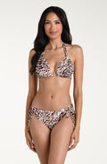 Woman wearing a zebra print bikini top and matching bottom against a white background