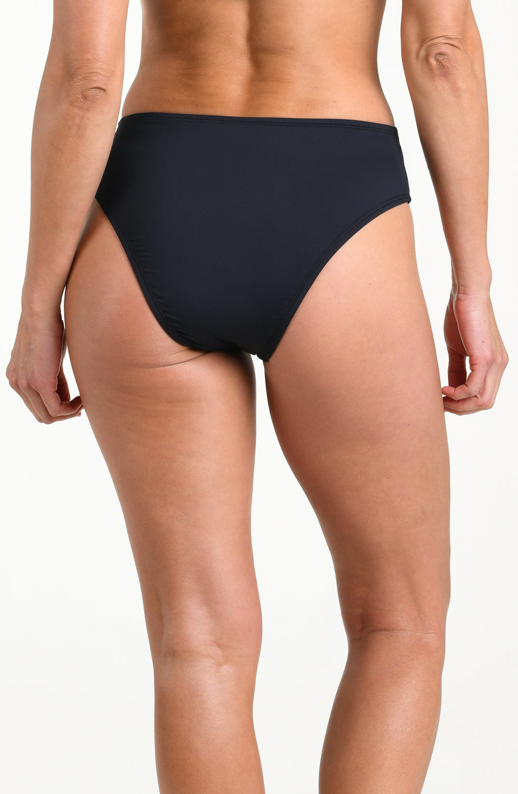 Person wearing black mid-waisted bikini bottoms on a white background
