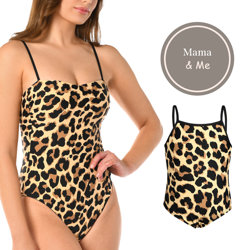 
                  
                    Toddler is wearing a black and tan leopard printed high neck one piece from our Mama and Me Running Wild collection.
                  
                