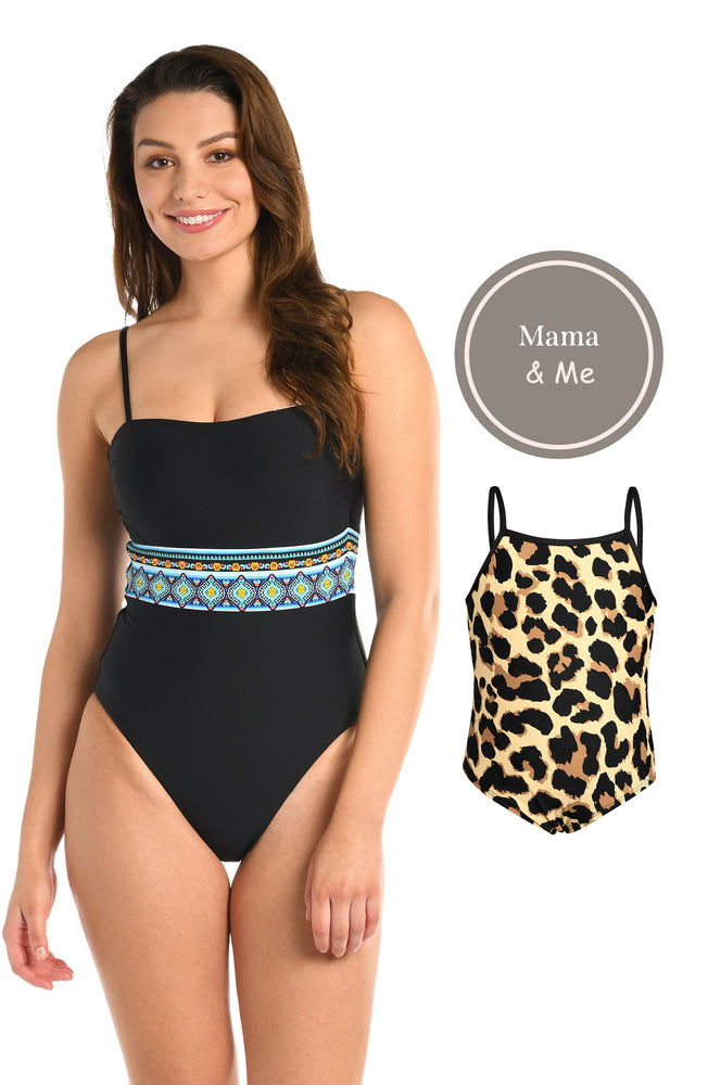 Toddler is wearing a black and tan leopard printed high neck one piece from our Mama and Me Running Wild collection.