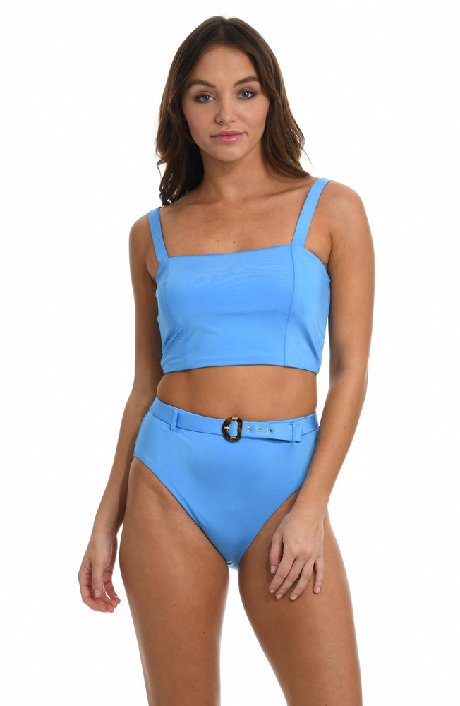 Model is wearing a solid sky blue colored midkini top from our Wanderlust Solids collection.