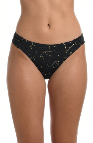 Model is wearing a solid black colored side shirred hipster bikini bottom from our Zodiac collection.