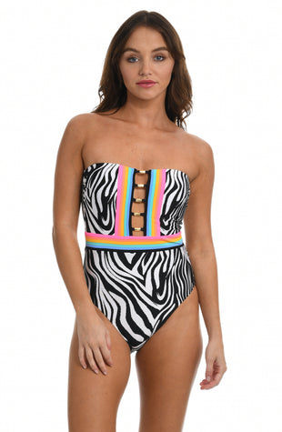 Model is wearing a black and white zebra printed bandeau one piece swimsuit from our Psychedelic Zebra collection.