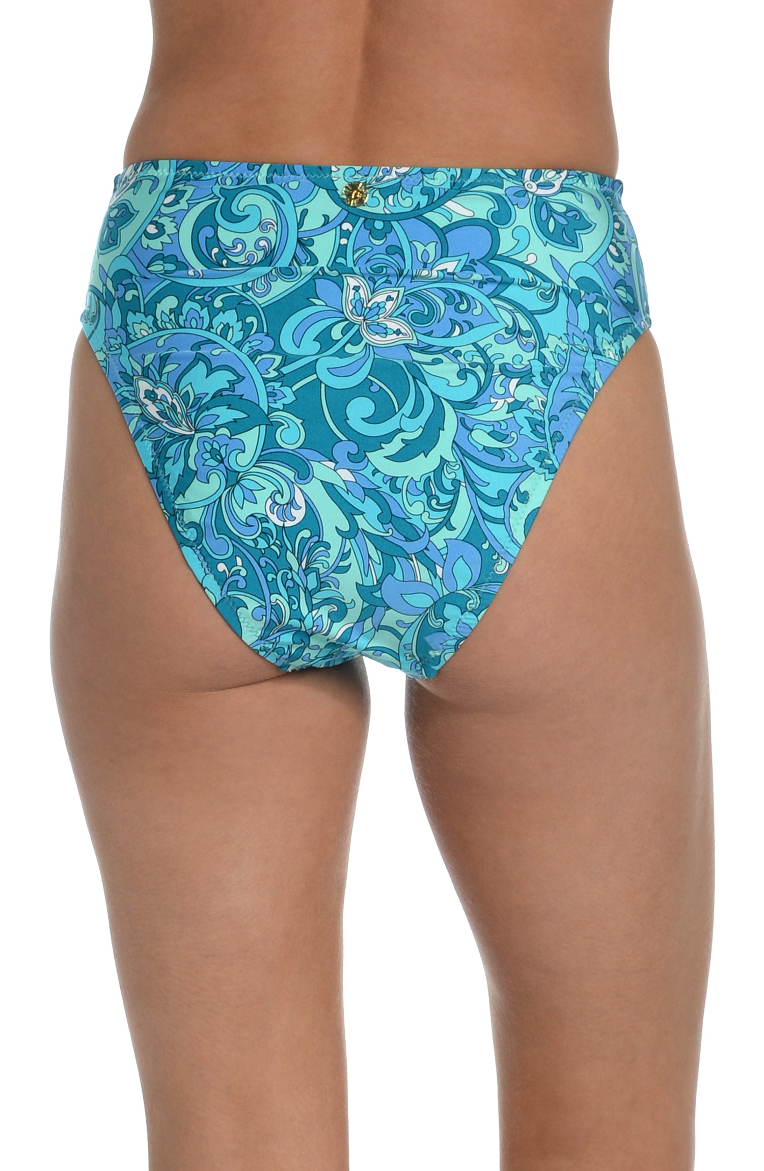 Model is wearing a teal blue bohemian printed high waist bikini bottom from our Boheme Paisley collection.