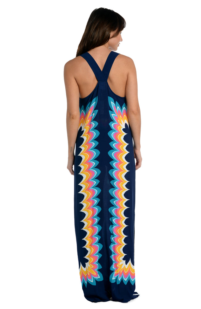 
            
                Load image into Gallery viewer, Model is wearing a navy multicolored geometric printed maxi dress cover up from our New Wave collection.
            
        