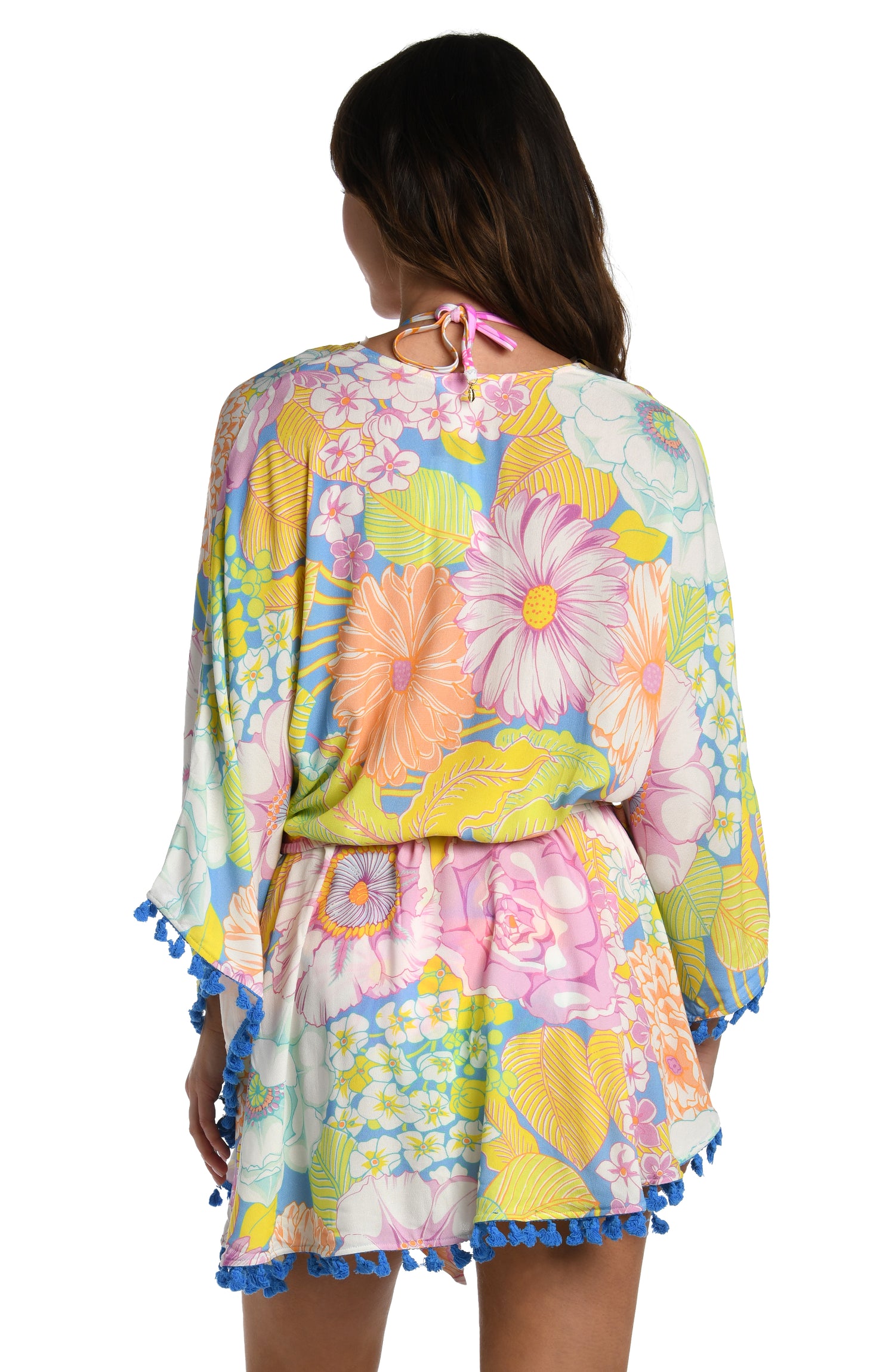 Model is wearing a light pastel multicolored floral printed kimono cover up from our Botanical Bliss collection.