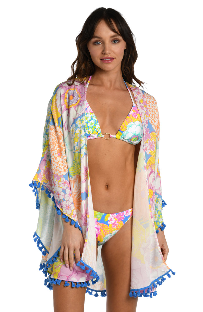 Model is wearing a light pastel multicolored floral printed kimono cover up from our Botanical Bliss collection.