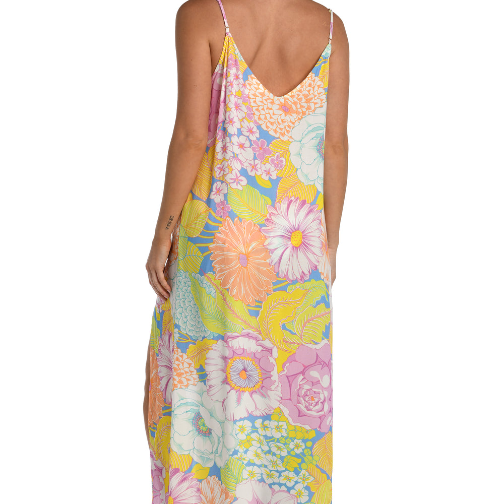 
                  
                    Model is wearing a light pastel multicolored floral printed maxi dress cover up from our Botanical Bliss collection.
                  
                