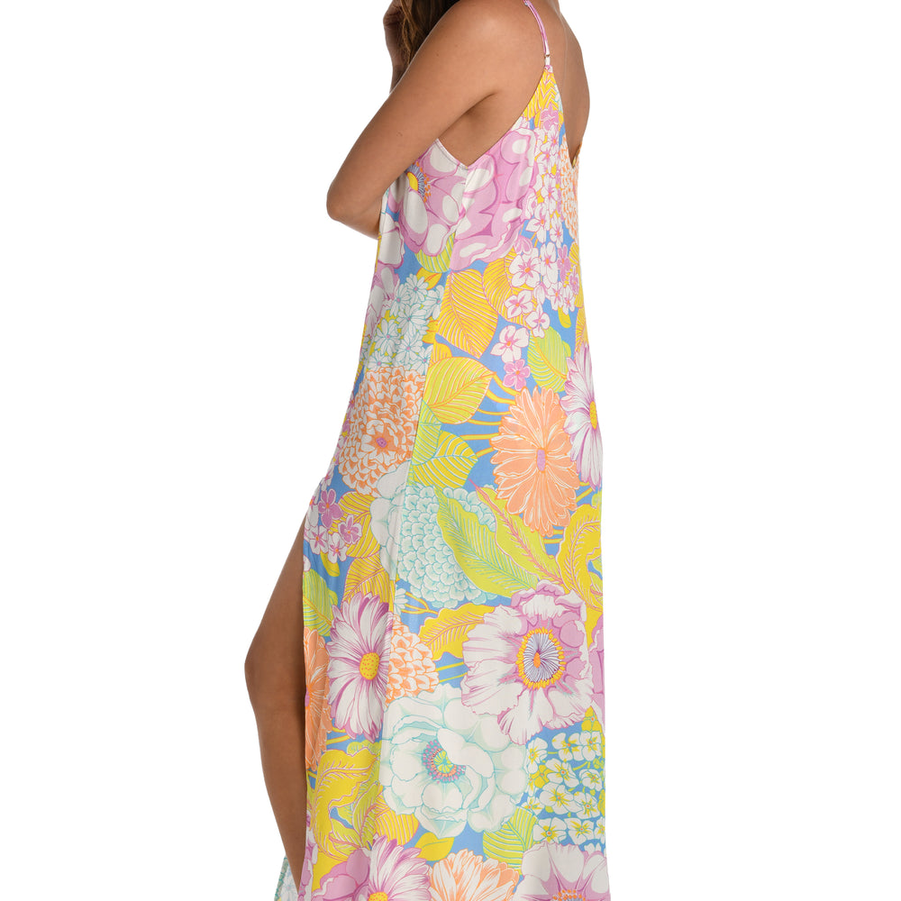 Model is wearing a light pastel multicolored floral printed maxi dress cover up from our Botanical Bliss collection.