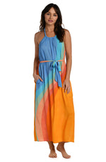 Model is wearing an orange and blue multicolored retro printed maxi dress cover up from our Mod Block collection.