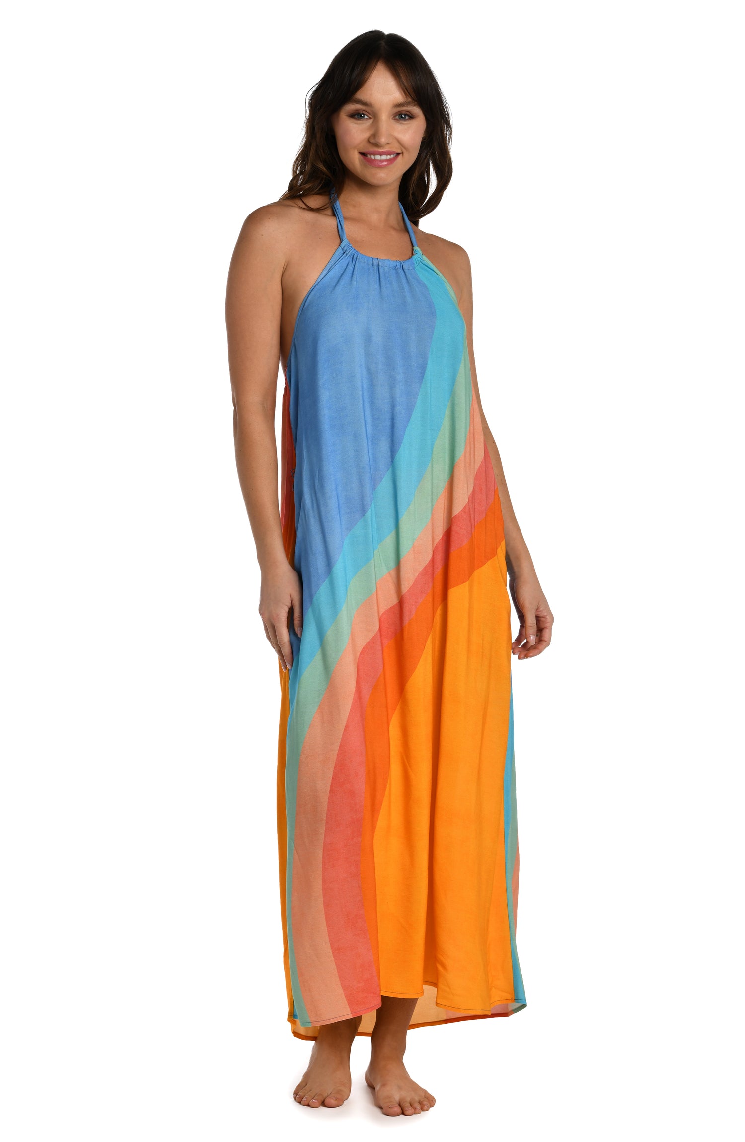 Model is wearing an orange and blue multicolored retro printed maxi dress cover up from our Mod Block collection.