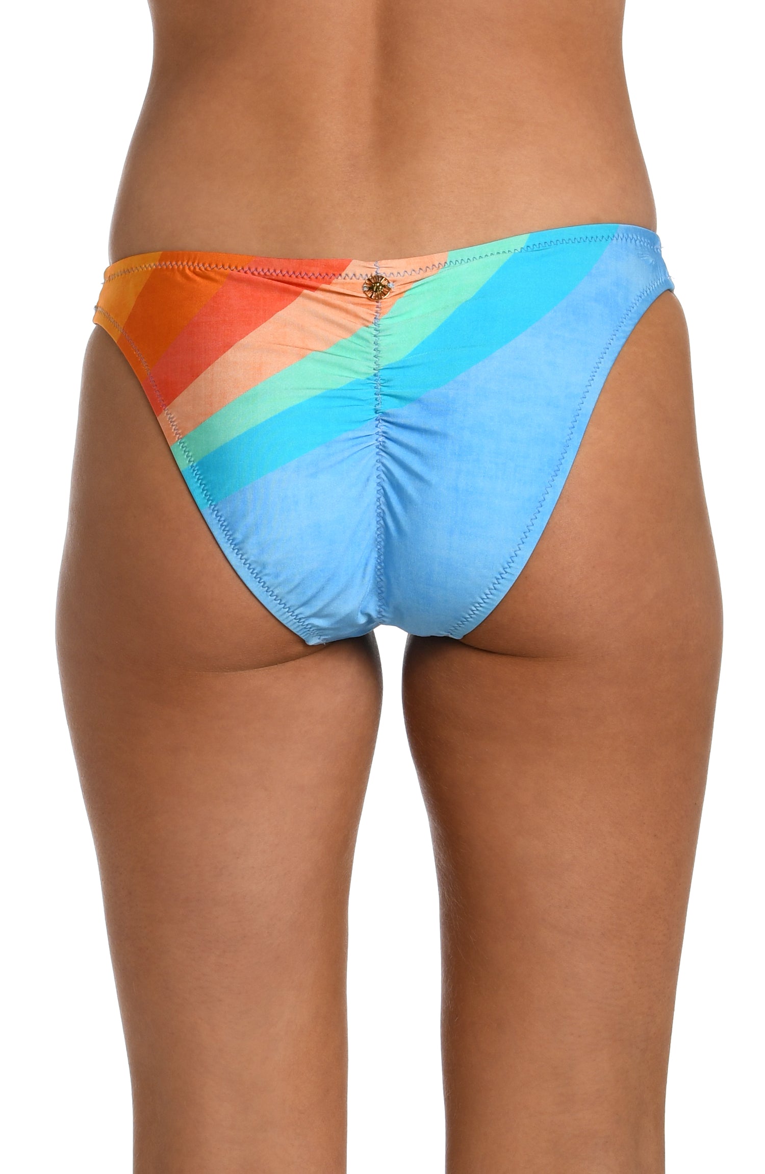 Model is wearing an orange and blue multicolored retro printed french cut bikini bottom from our Mod Block collection.