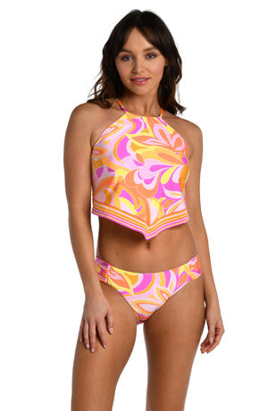 Model is wearing a pink, white, and orange multicolored retro printed high neck midkini top from our Retro Swirl collection.