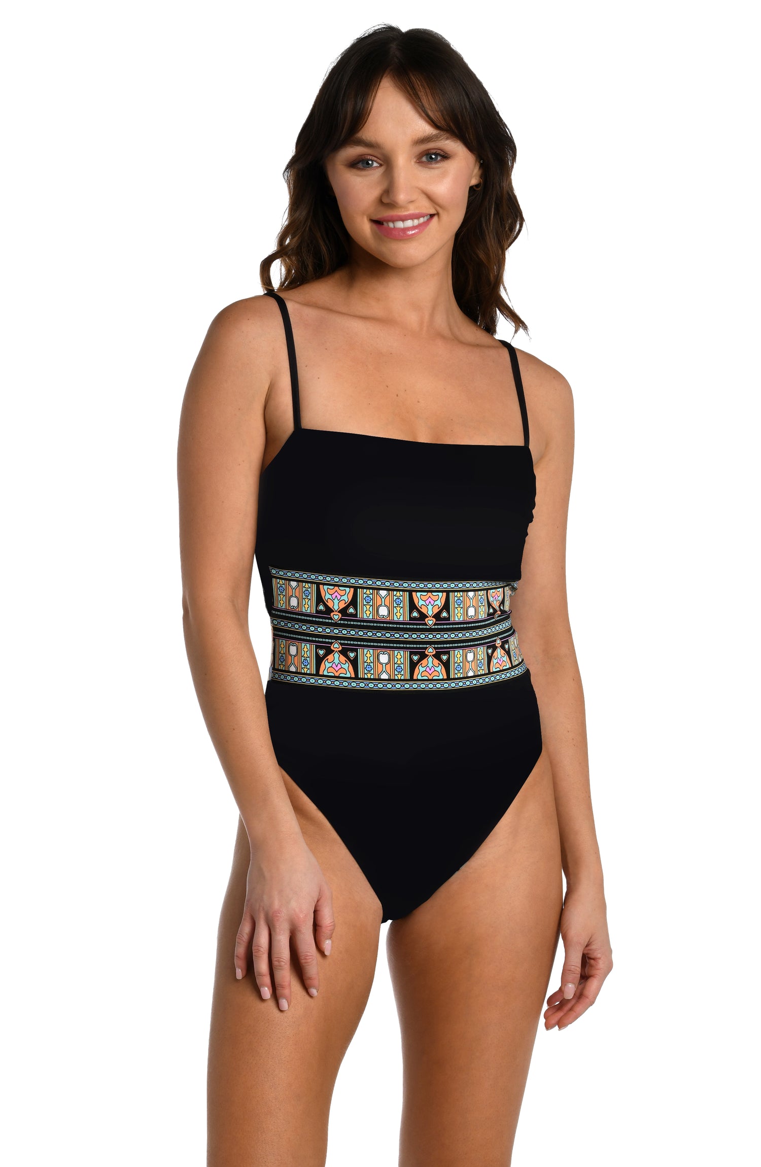 Model is wearing a black multicolored paisley printed reversible black bandeau one piece swimsuit from our Paisley Patchwork collection.