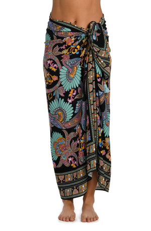 Model is wearing a black multicolored paisley printed pareo wrap cover up from our Paisley Patchwork collection.