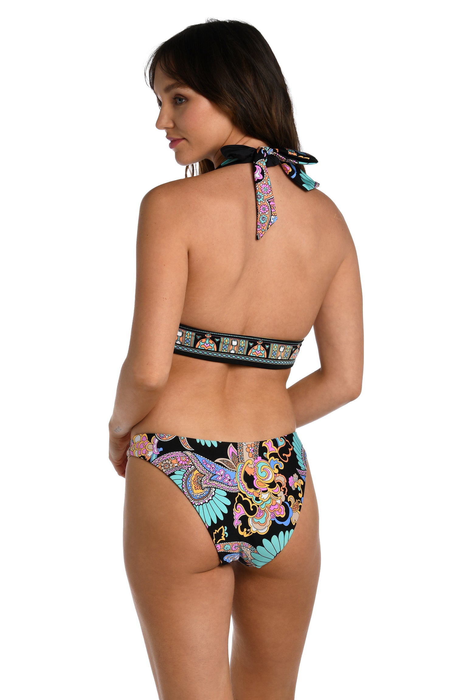 Model is wearing a black multicolored paisley printed reversible black banded halter triangle bikini top from our Paisley Patchwork collection.