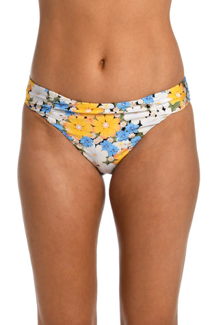 Model is wearing a multicolored daisy printed side shirred hipster bikini bottom from our Daisy Daze collection.