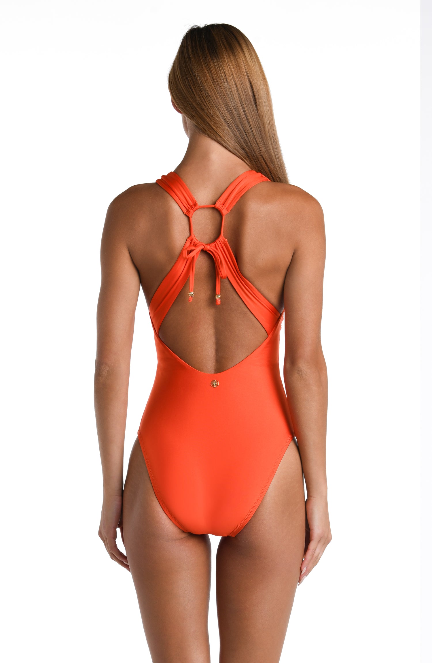 Model is wearing a solid vibrant orange colored Keyhole V-Plunge One Piece