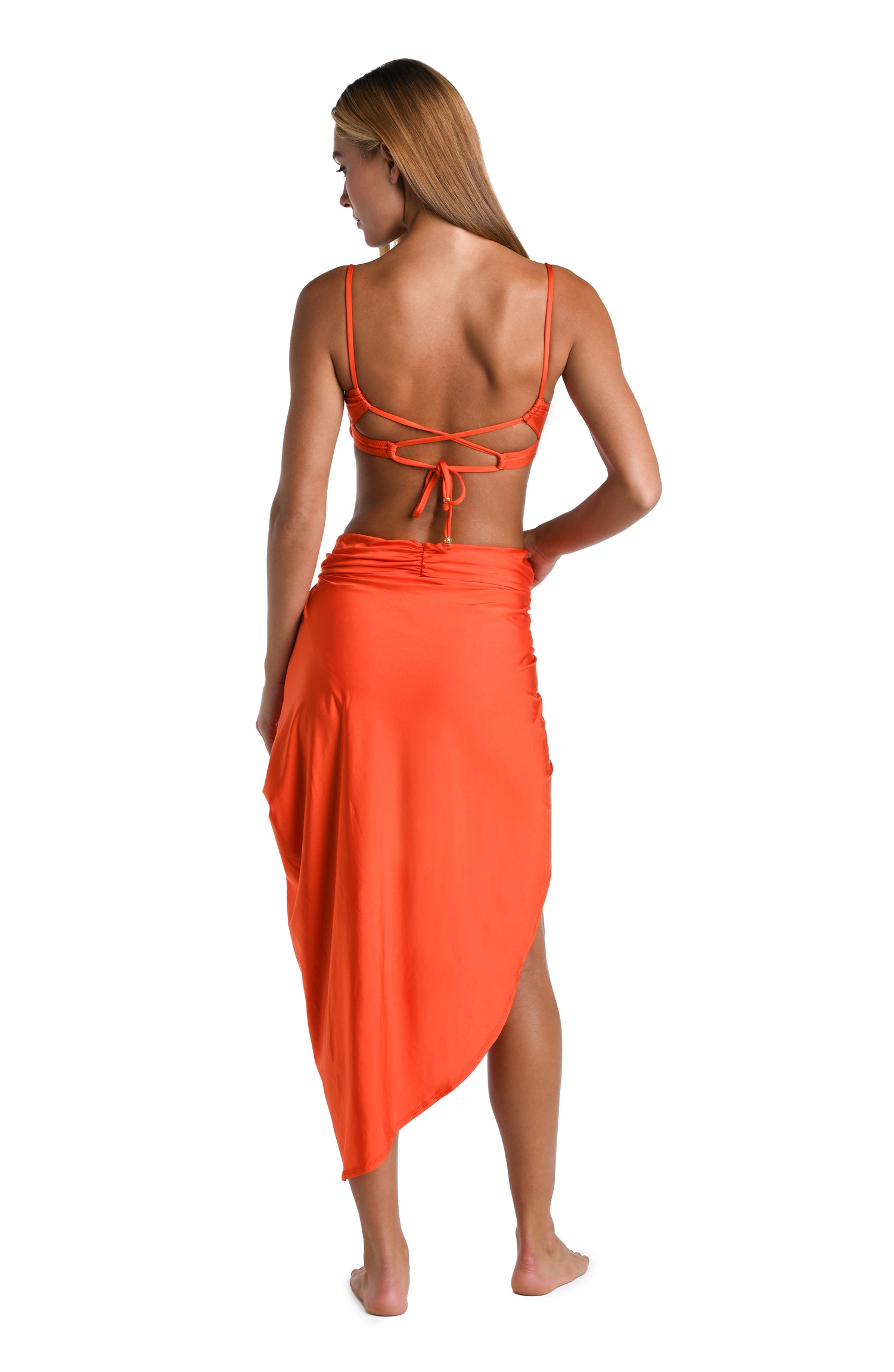 Model is wearing a solid vibrant orange colored Pull-On Faux Pareo Cover Up