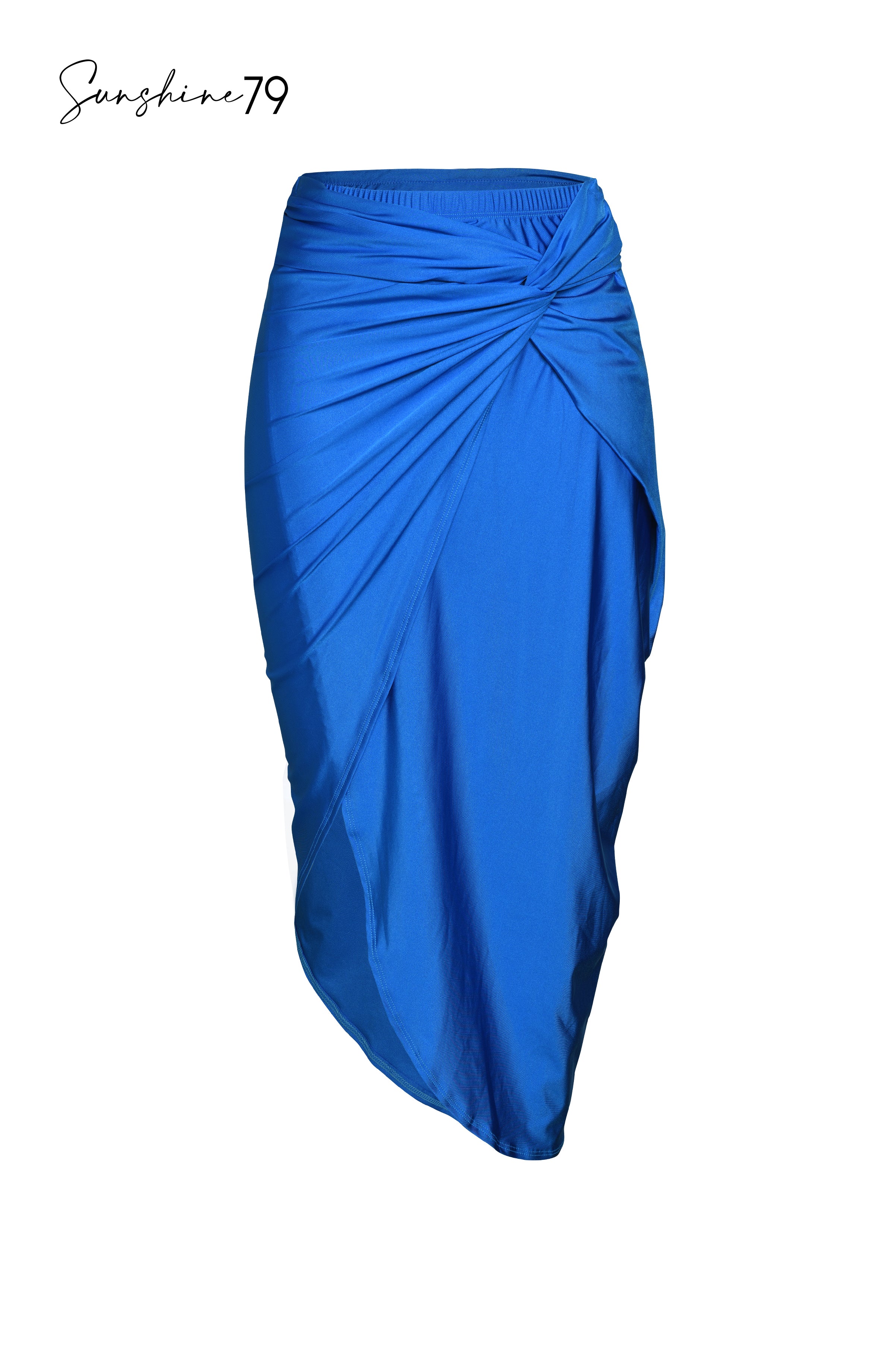 Model is wearing a solid cobalt blue colored pull on faux pareo wrap cover up from our Sunshine 79 brand.