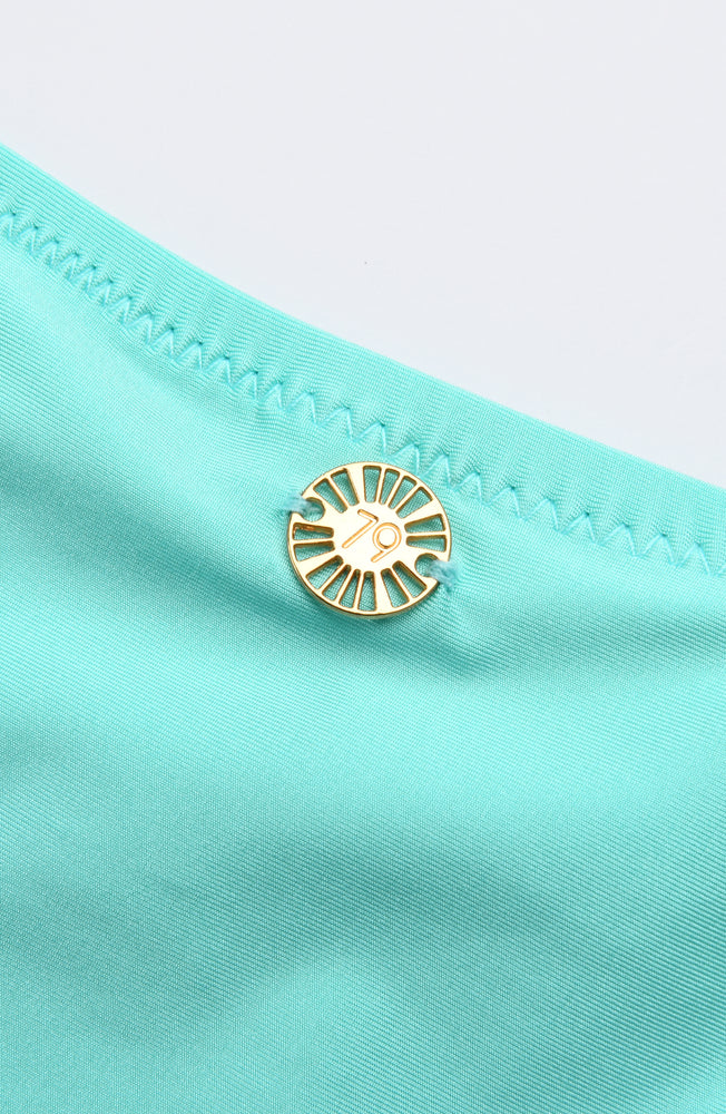 Detail image of the Sunshine 79 Sunshine Solids Side Shirred Hipster Bottom in Seaglass.