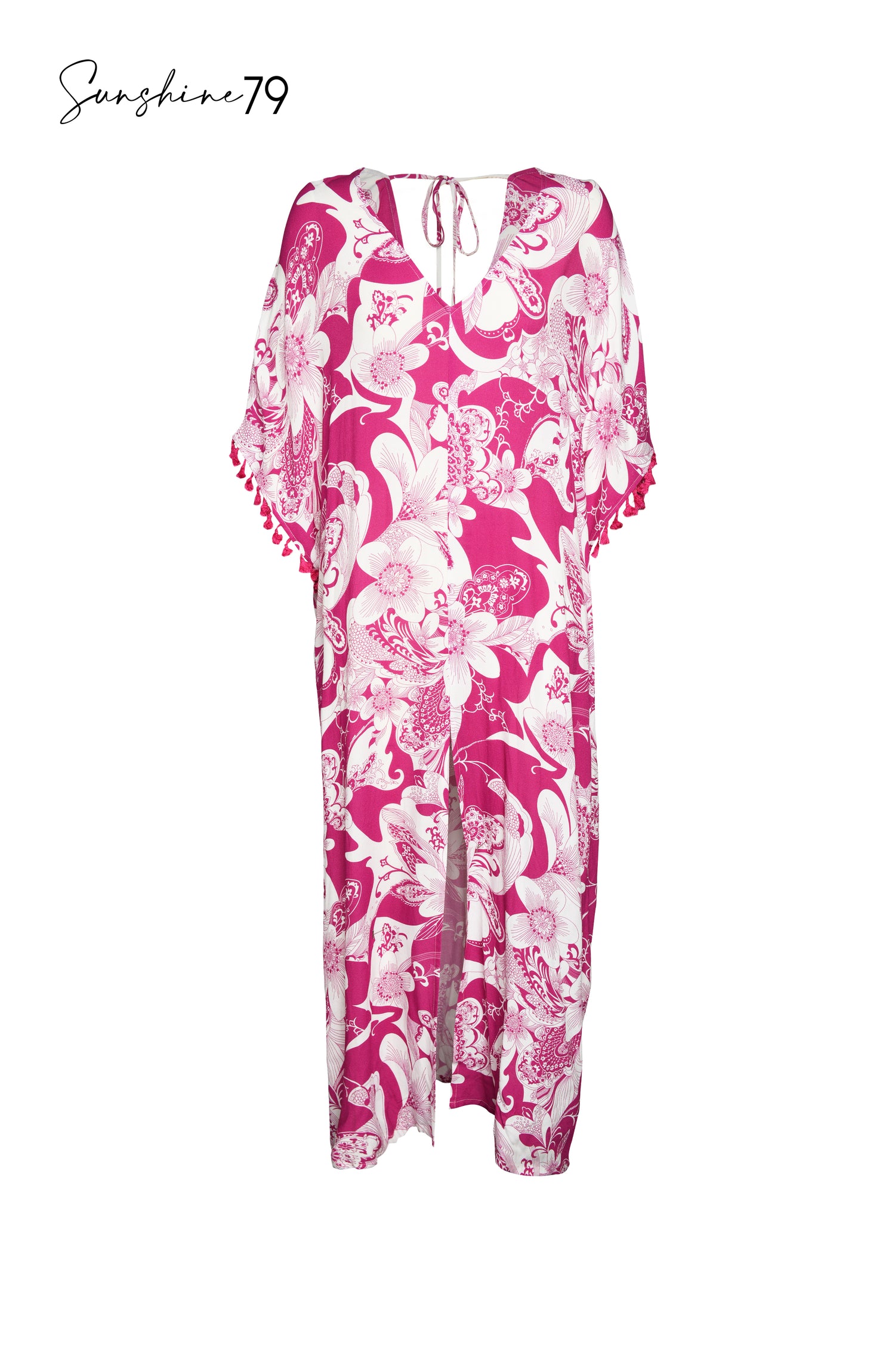 Model is wearing a fuchsia and white multicolored tropical printed maxi dress cover up from our Sunshine 79 brand.