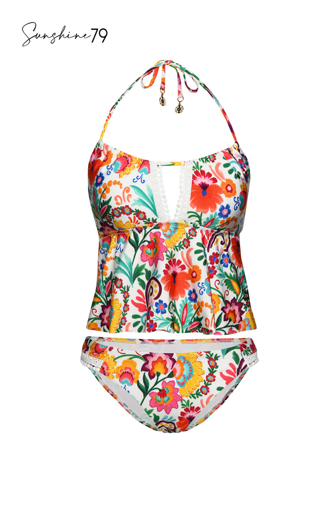Model is wearing a multicolored spanish inspired printed french cut bikini bottom from our Sunshine 79 brand.
