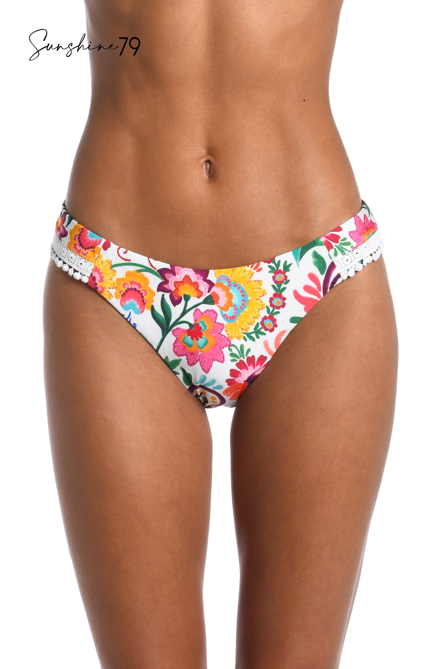Model is wearing a multicolored spanish inspired printed french cut bikini bottom from our Sunshine 79 brand.