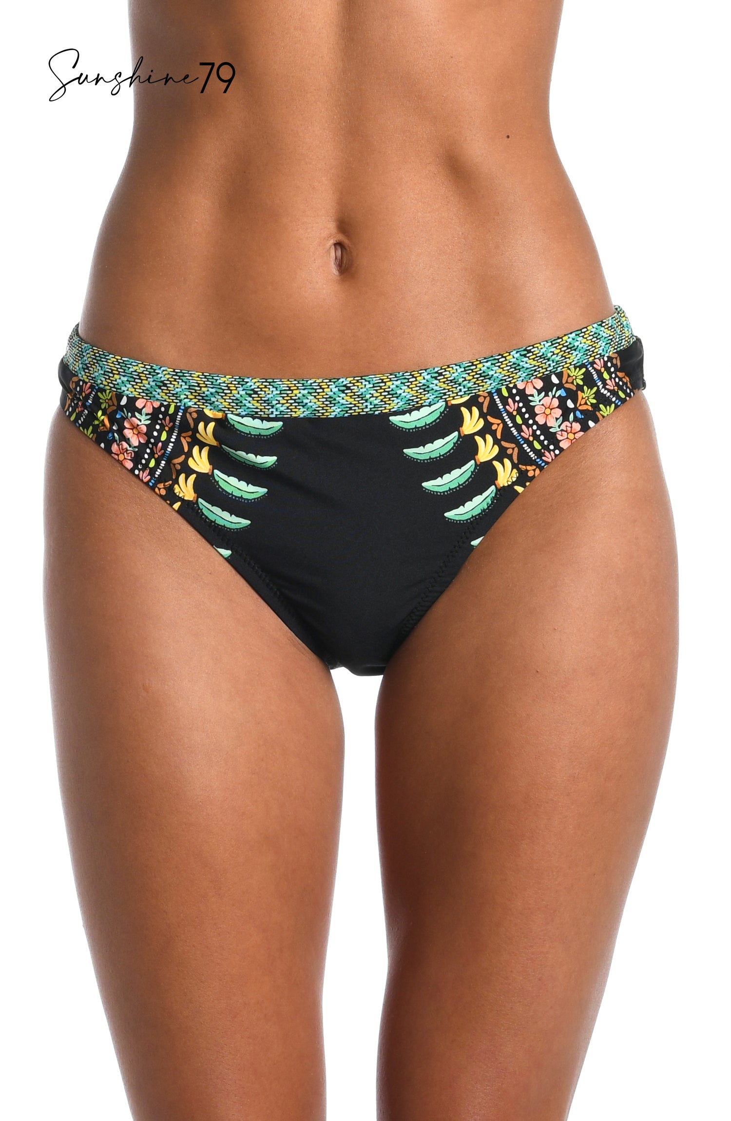 Model is wearing a black multicolored tropical palm tree printed hipster bikini bottom from our Sunshine 79 brand.