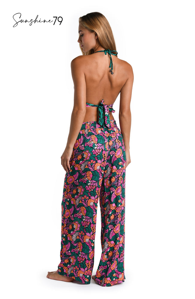 Model is wearing a multicolored Palazzo Pant Swim Cover Up
