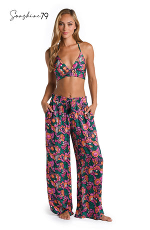 Model is wearing a multicolored Palazzo Pant Swim Cover Up