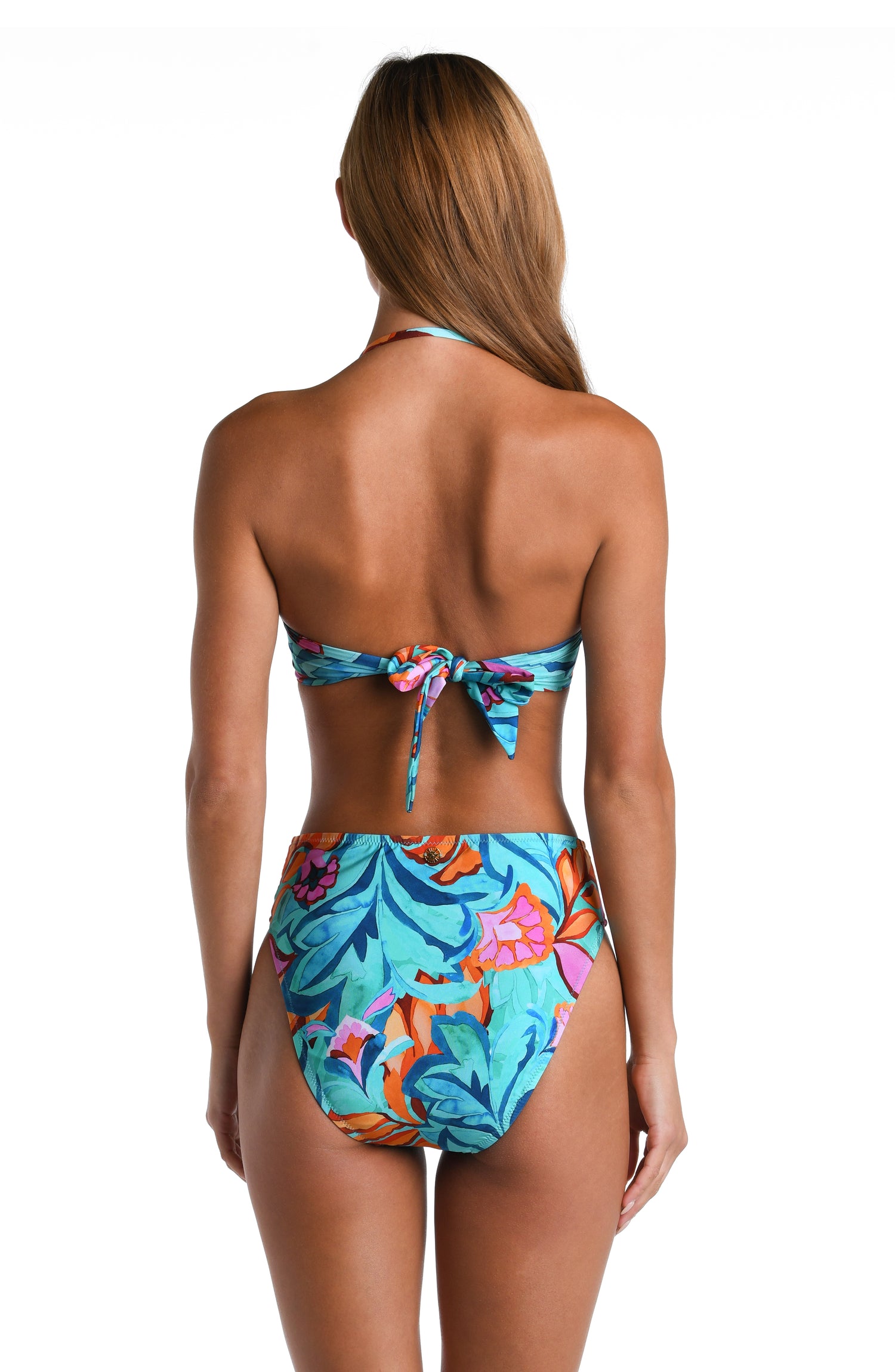 Model is wearing a turquoise, blue, coral multicolored floral printed Bandeau Bikini Top