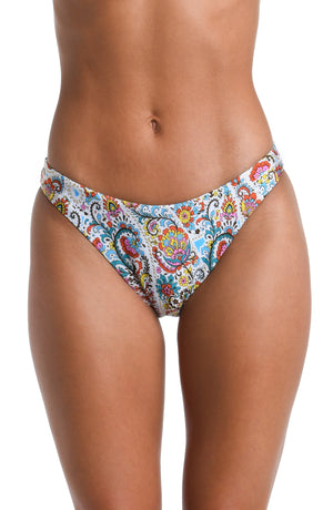 Model is wearing a white, red, blue, green, and yellow multicolored paisley printed French Cut Bikini Bottom