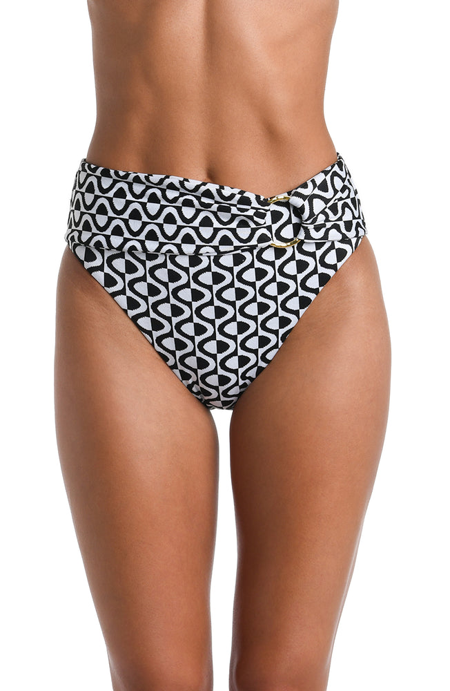 Model is wearing a black and white geometric patterned High-Waist Bottom
