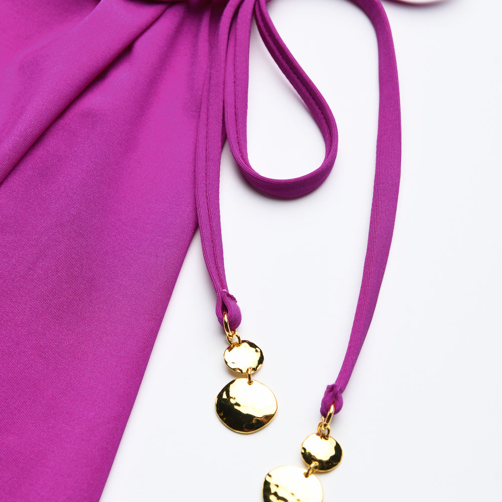 
                  
                    Detail image of the Sunshine 79 Sunshine Solids Wrap Skirt Cover Up in Bright Violet.
                  
                