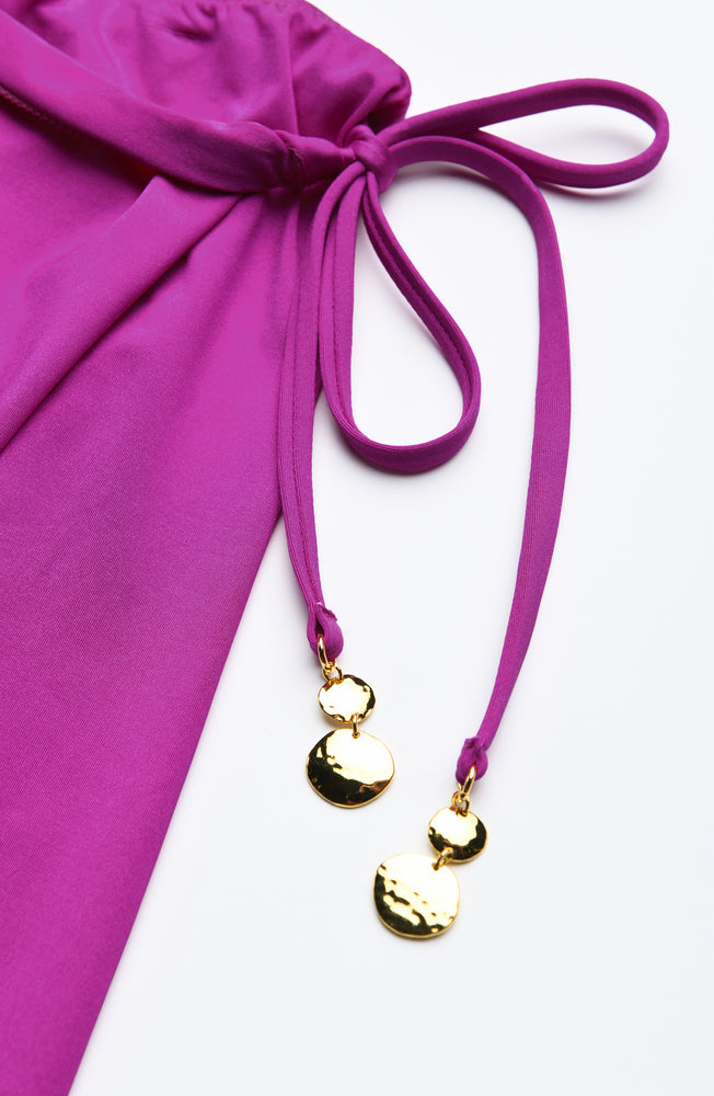 Detail image of the Sunshine 79 Sunshine Solids Wrap Skirt Cover Up in Bright Violet.