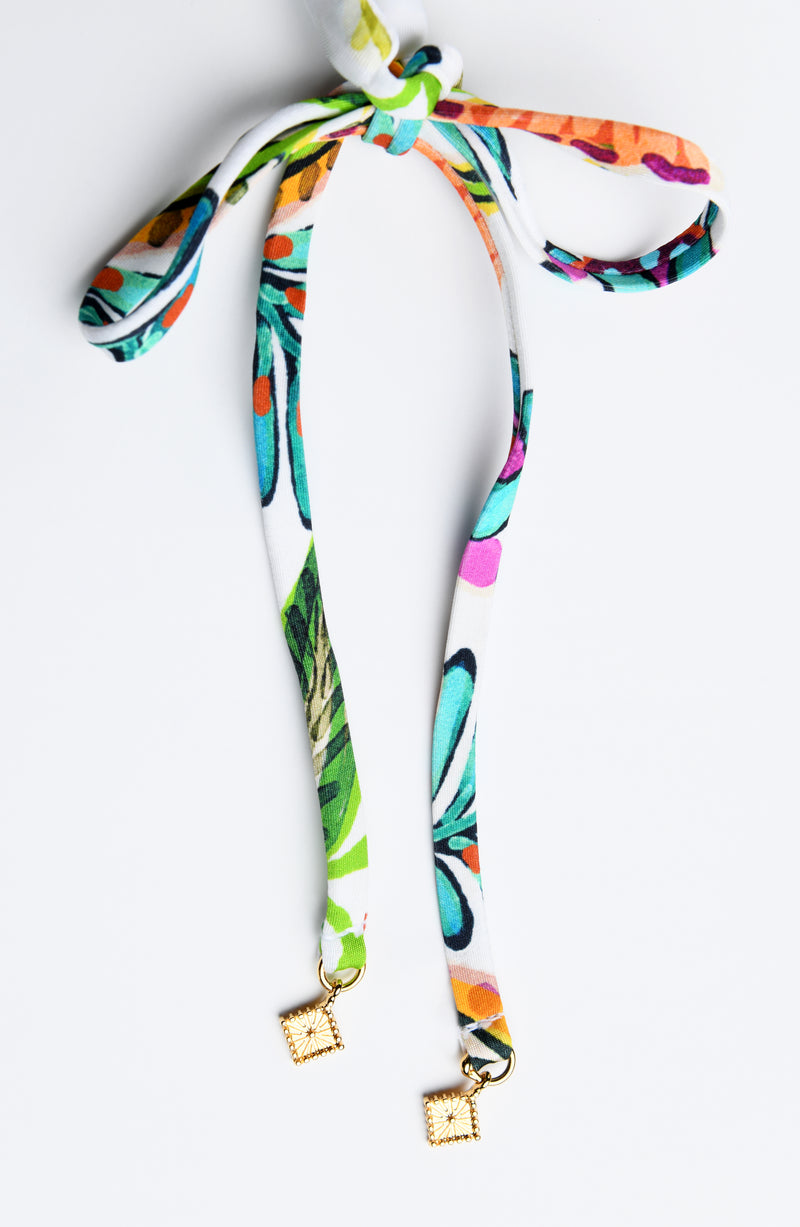 Detail image of the Sunshine 79 Jungle Jive Banded Halter Top charms.