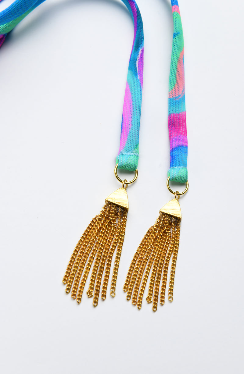 Detail image of the Sunshine 79 Swirltopia Halter Midi Dress Tassel Charms.