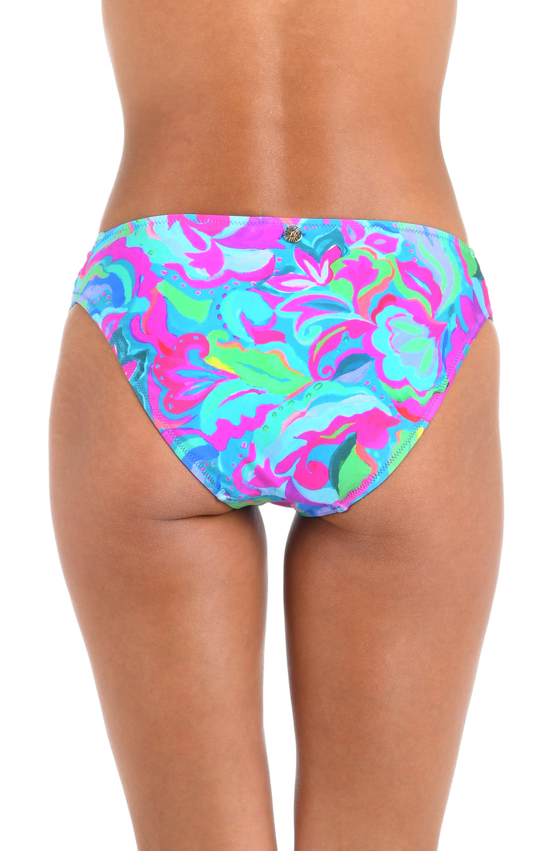 Back image of model wearing the Sunshine 79 Swirltopia Side Shirred Hipster Bottom.