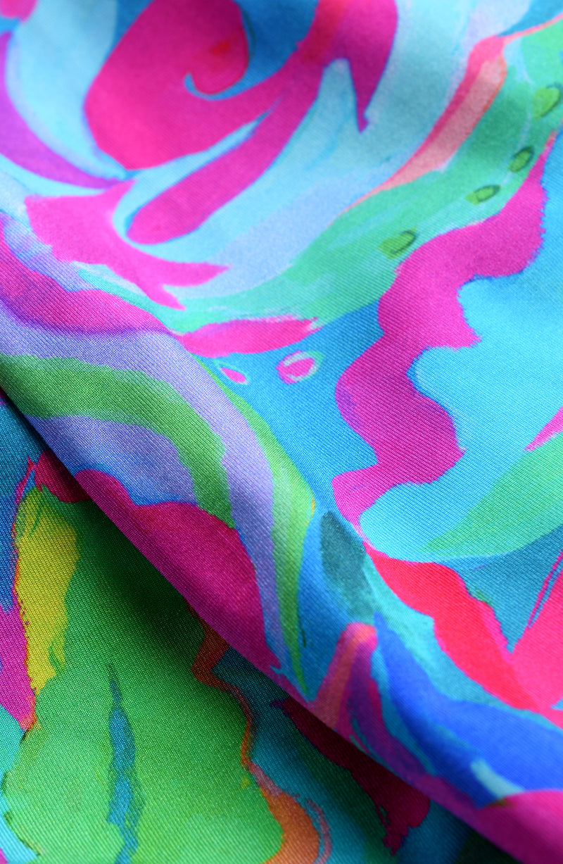 Detail image of the Sunshine 79 Swirltopia swimwear fabric.