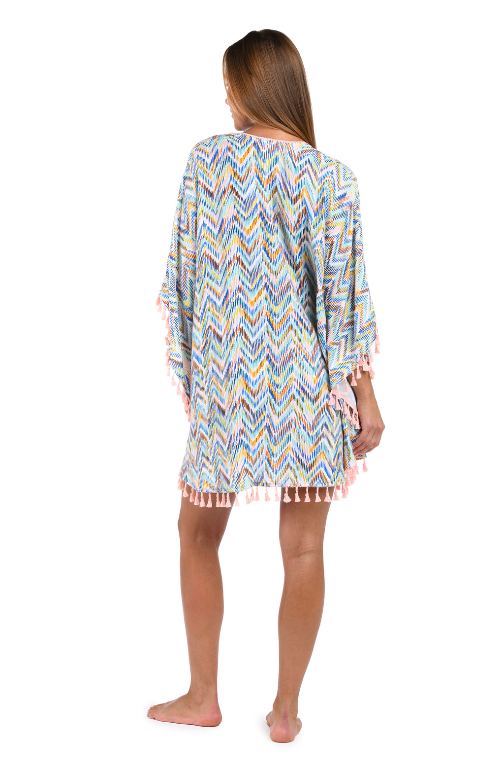 Back image of model wearing the Soul Wave Open Front Kimono in white multi colored geometrical print.