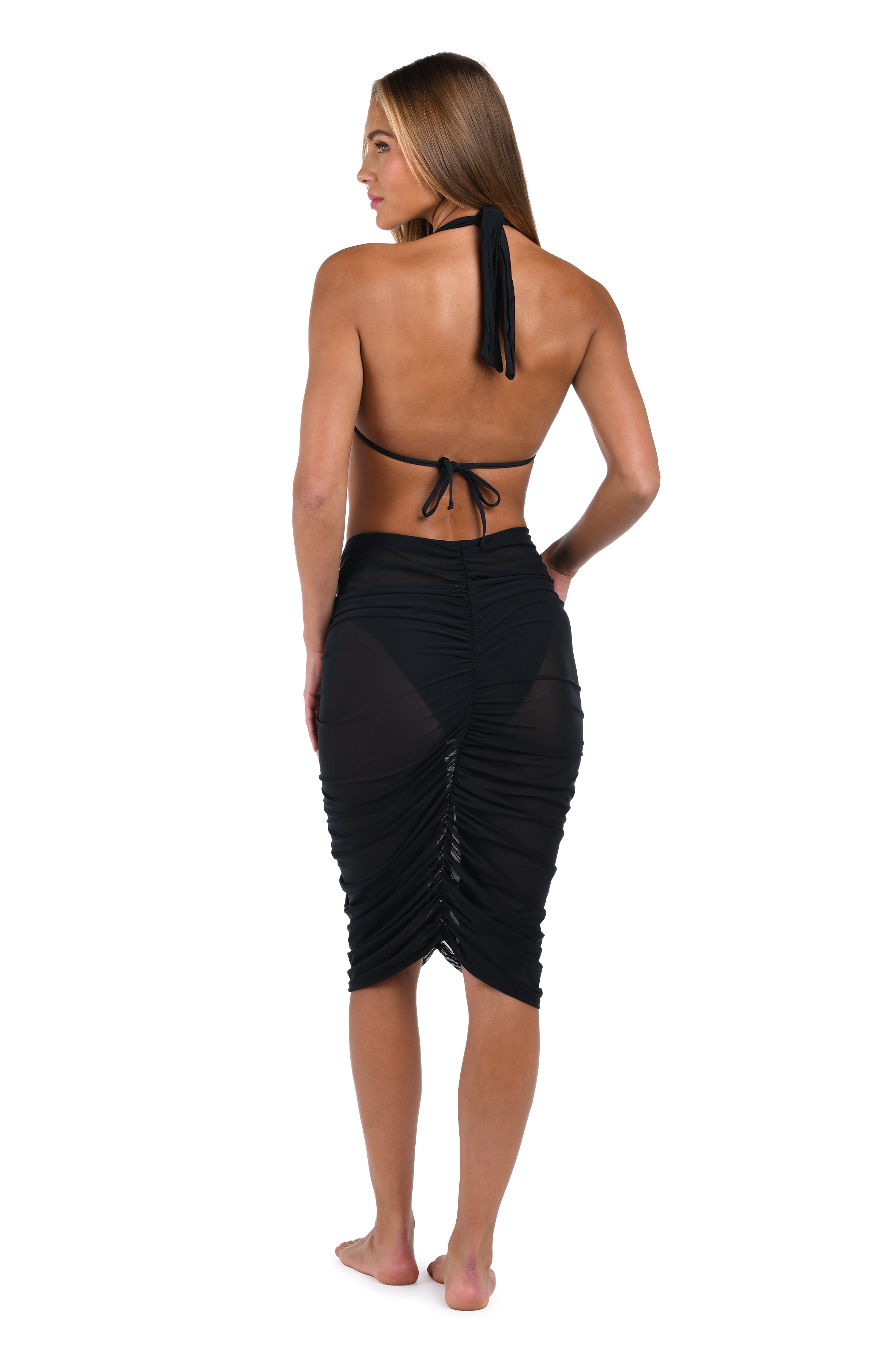Back image of model wearing the Maximal Mesh Skirt Cover Up in Black.