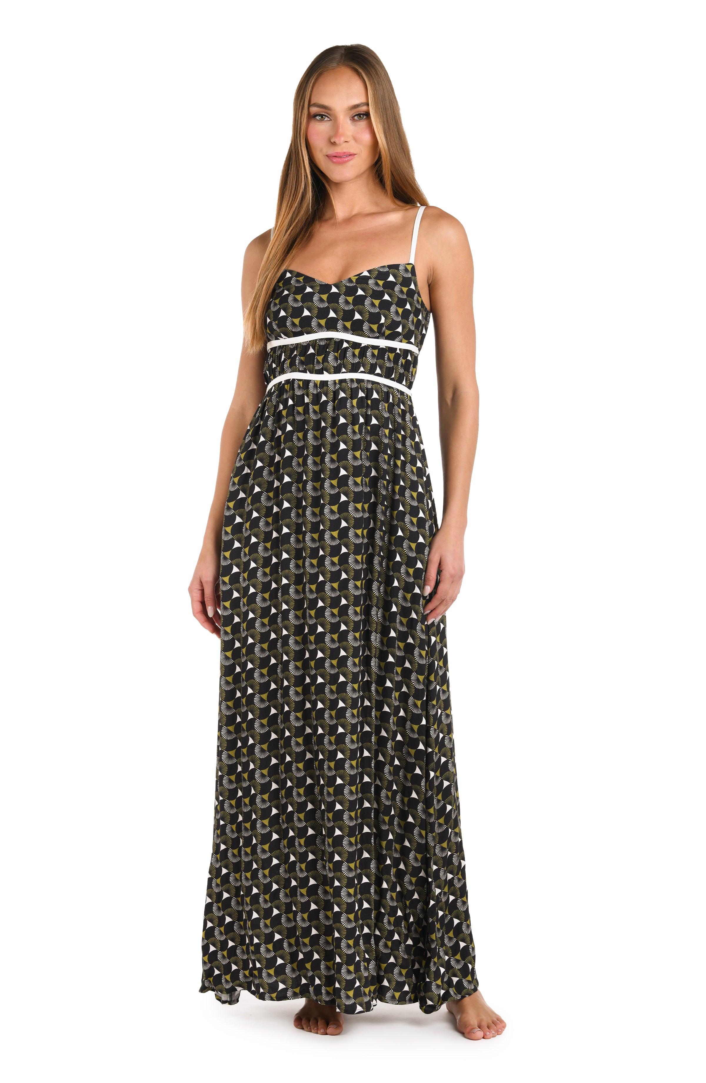 Front image of model wearing a black and white geometric printed maxi dress cover up. 